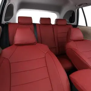 Red custom-fitted seat covers displayed on front and rear vehicle seats.