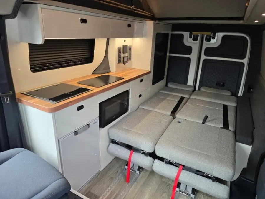 Kia’s PV5 electric campervan has two beds and a fully equipped kitchen [Images]