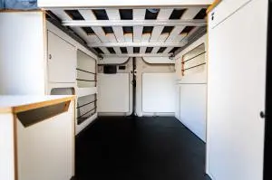 Timber Van Kits Wheel Well Cabinet and Bed System in White