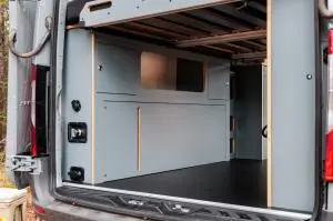 Timber Van Kits Wheel Well Cabinet and Bed System in Winter Blue
